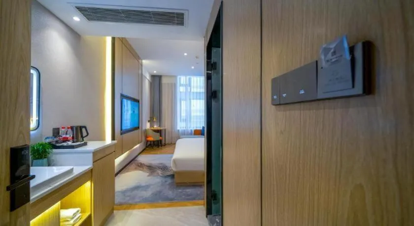 Bed in Borrman Hotel Zhangzhou Baolong Plaza