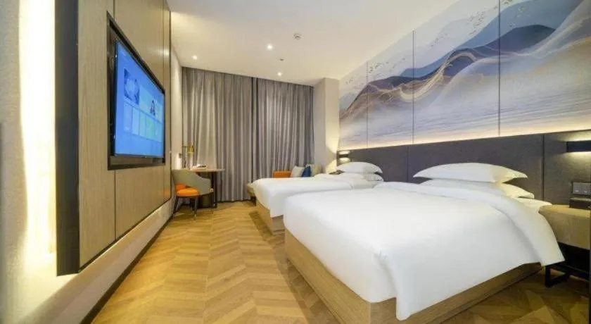 Bed in Borrman Hotel Zhangzhou Baolong Plaza