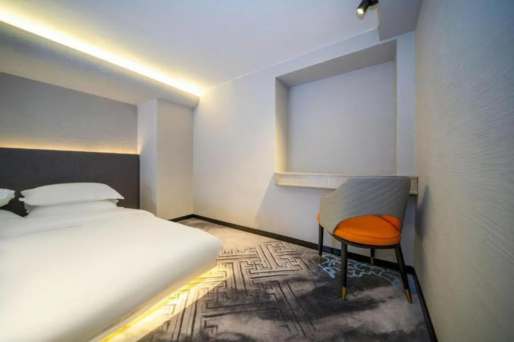 Bed in Borrman Hotel Zhangzhou Baolong Plaza