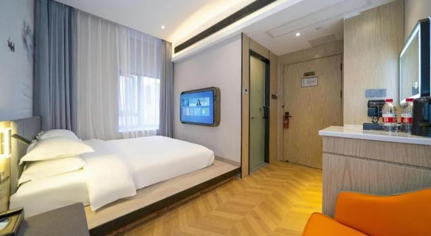 Bed in Borrman Hotel Zhangzhou Baolong Plaza