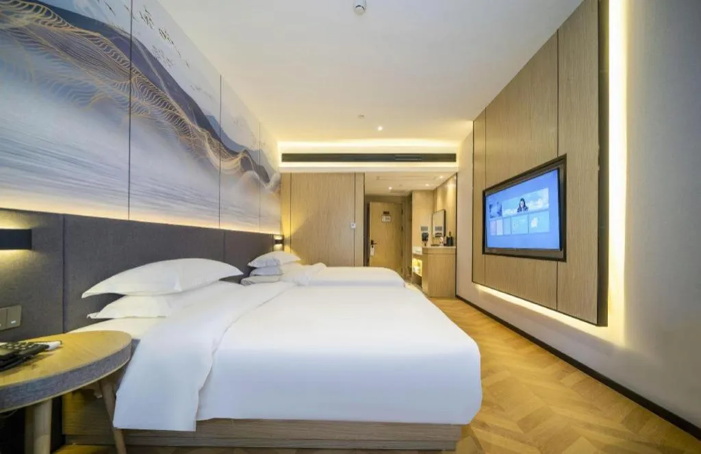 Bed in Borrman Hotel Zhangzhou Baolong Plaza
