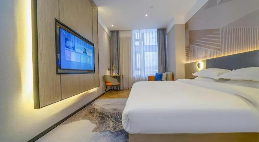 Bed in Borrman Hotel Zhangzhou Baolong Plaza