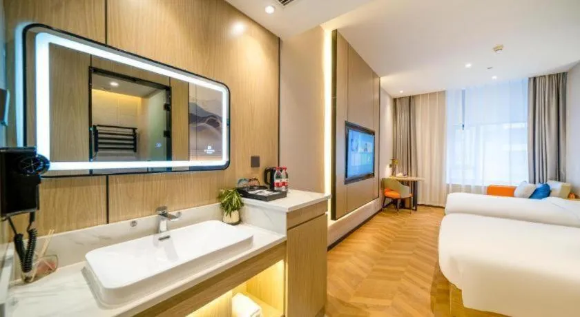 Bed in Borrman Hotel Zhangzhou Baolong Plaza