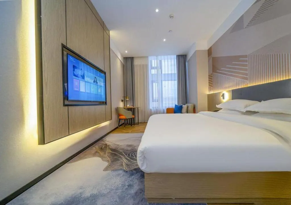 Bed in Borrman Hotel Zhangzhou Baolong Plaza