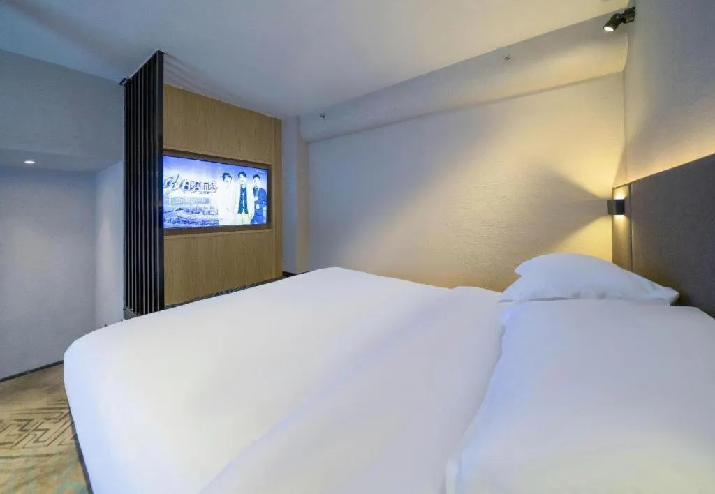 Bed in Borrman Hotel Zhangzhou Baolong Plaza