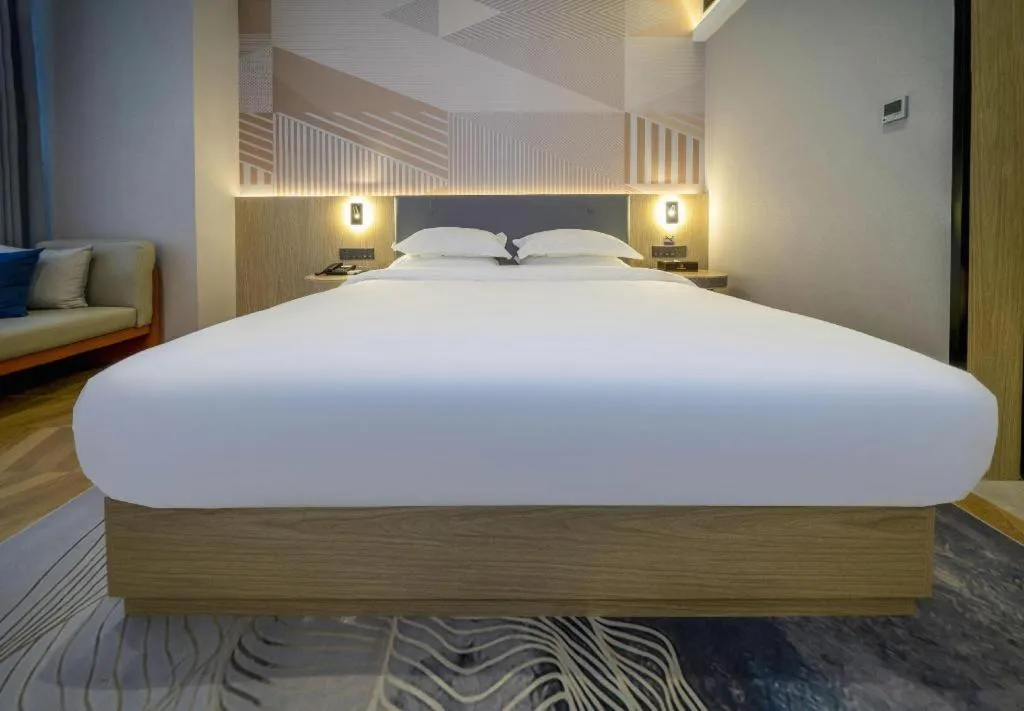 Bed in Borrman Hotel Zhangzhou Baolong Plaza