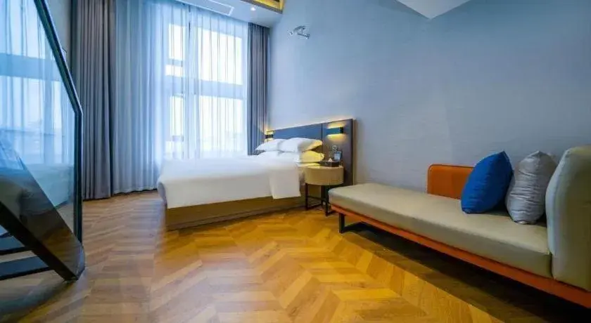 Bed in Borrman Hotel Zhangzhou Baolong Plaza Bed in Borrman Hotel Zhangzhou Baolong Plaza