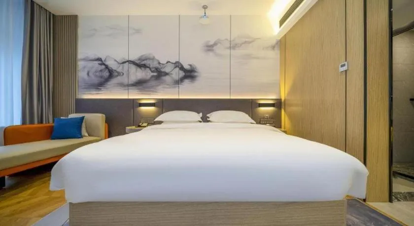 Bed in Borrman Hotel Zhangzhou Baolong Plaza