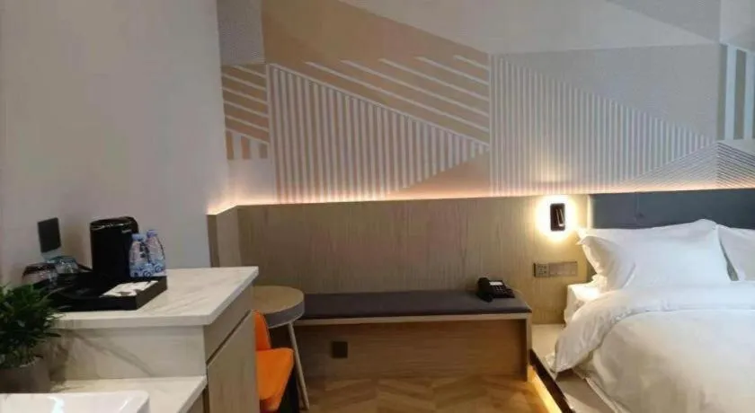 Bed in Borrman Hotel Zhangzhou Baolong Plaza