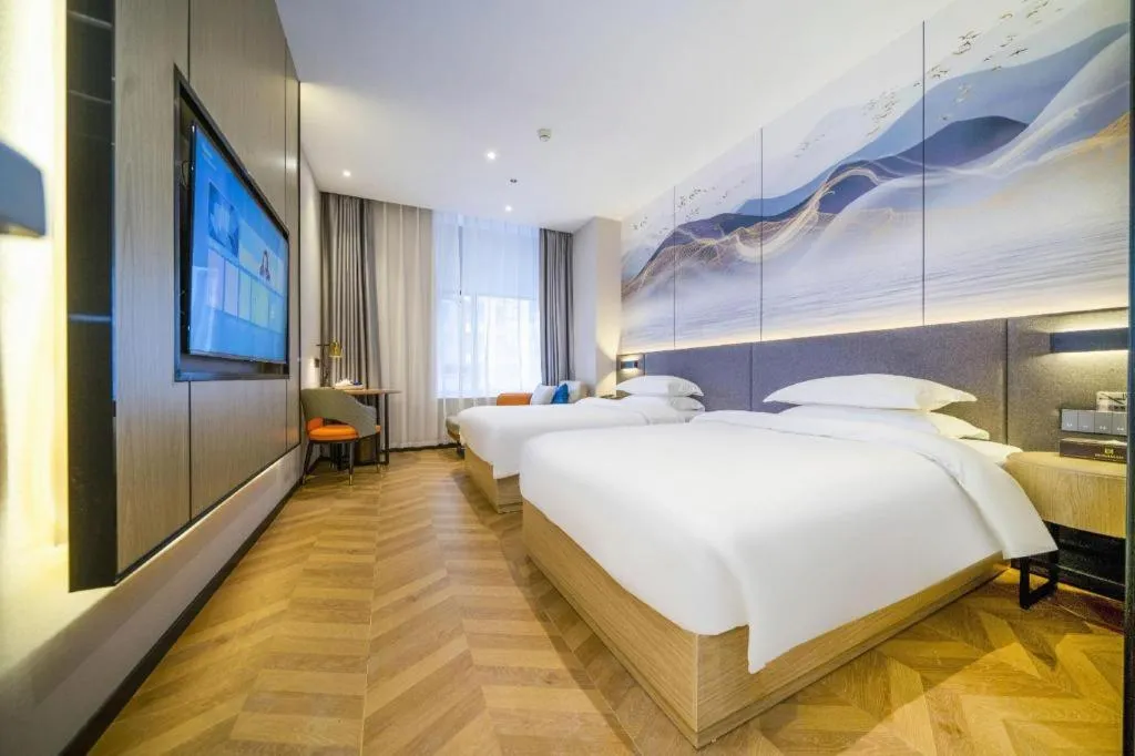 Bed in Borrman Hotel Zhangzhou Baolong Plaza