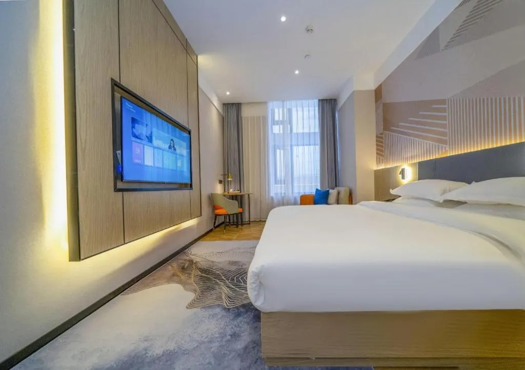 Bed in Borrman Hotel Zhangzhou Baolong Plaza