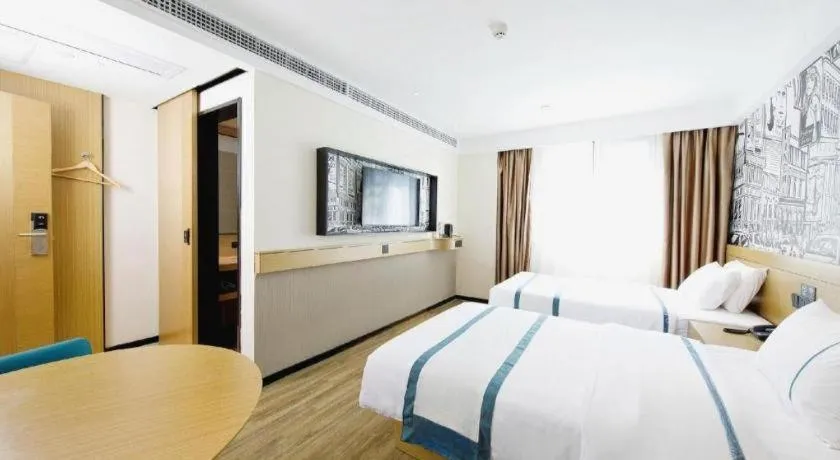 Bed in City Comfort Inn Wuhan Yangtze River Bridge Yellow Crane Tower