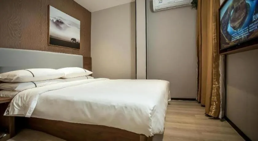 Bed in JTOUR Inn Wuhan Textile University