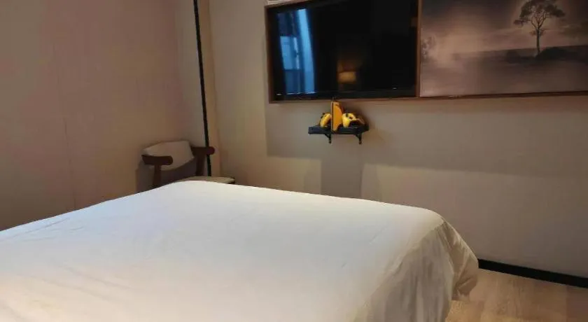 Bed in JTOUR Inn Wuhan Textile University