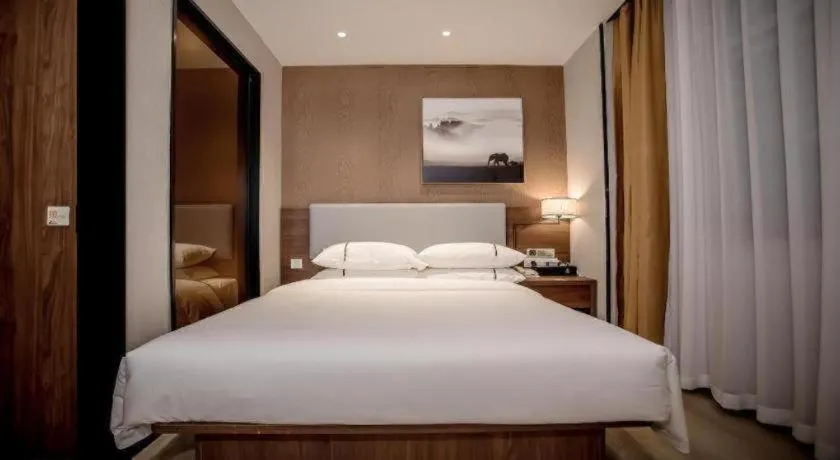 Bed in JTOUR Inn Wuhan Textile University