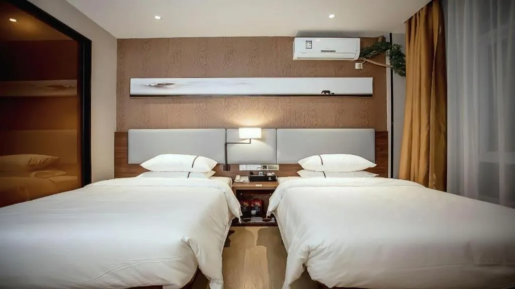 Bed in JTOUR Inn Wuhan Textile University