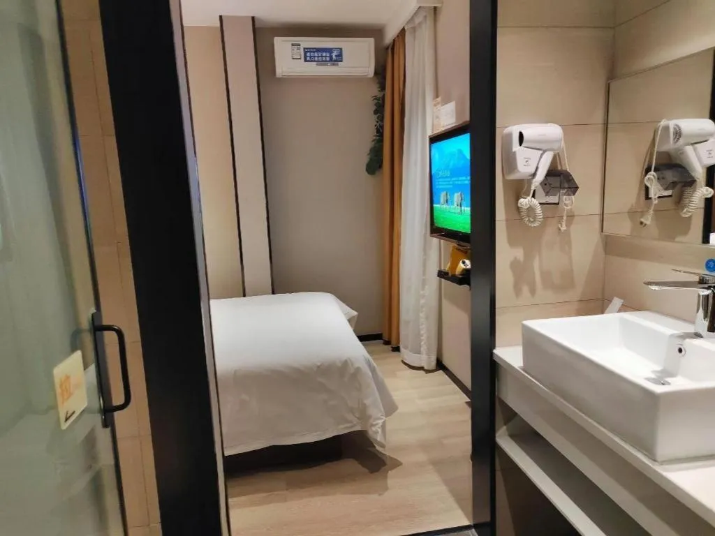 Bed in JTOUR Inn Wuhan Textile University