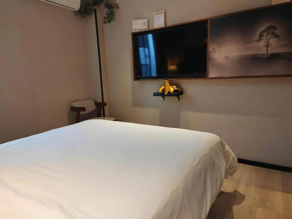 Bed in JTOUR Inn Wuhan Textile University