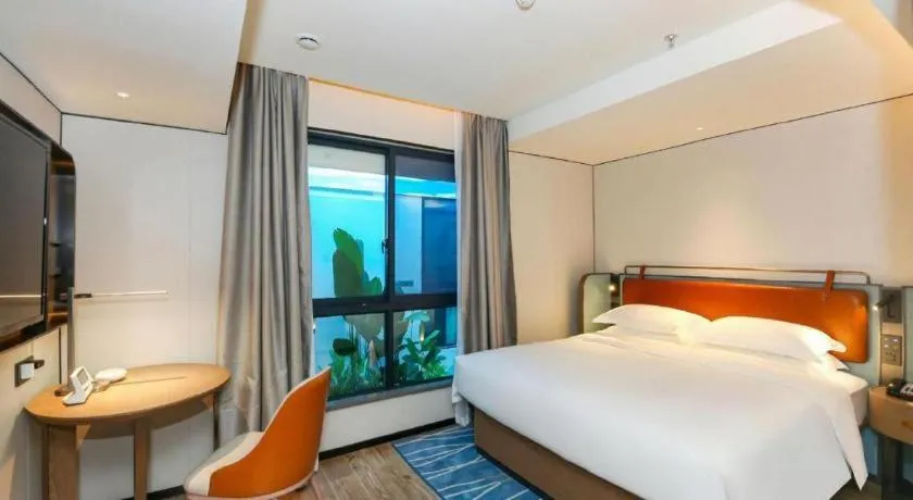 Bed in Echarm Hotel Guangzhou South Railway Station