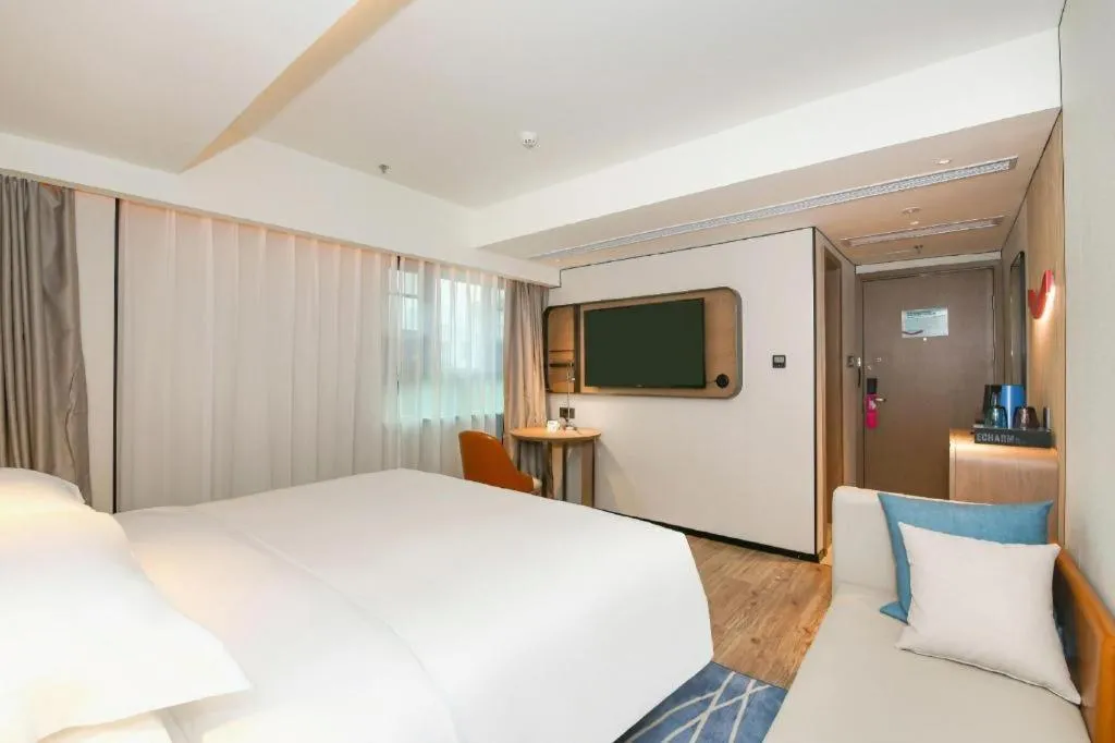 Bed in Echarm Hotel Guangzhou South Railway Station