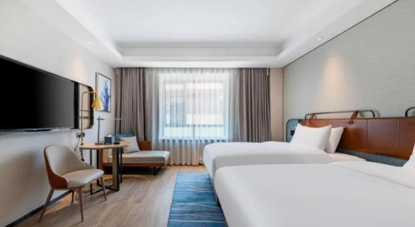 Bed in Echarm Hotel Guangzhou South Railway Station