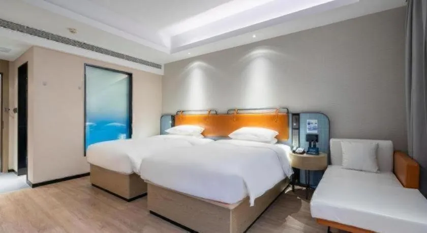 Bed in Echarm Hotel Guangzhou South Railway Station