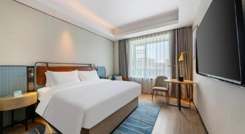 Bed in Echarm Hotel Guangzhou South Railway Station