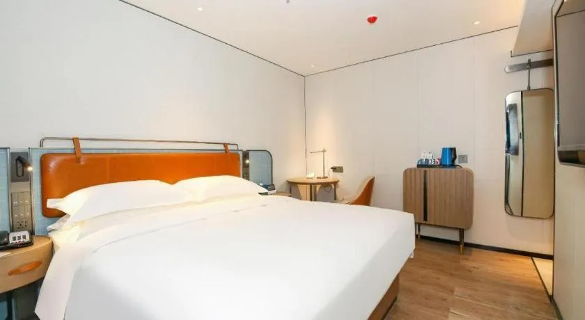 Bed in Echarm Hotel Guangzhou South Railway Station