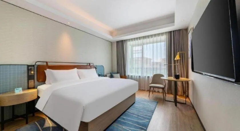 Bed in Echarm Hotel Guangzhou South Railway Station