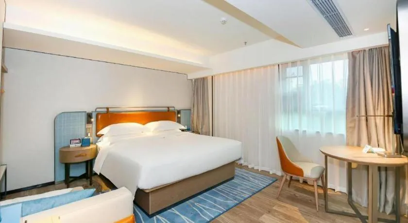 Bed in Echarm Hotel Guangzhou South Railway Station