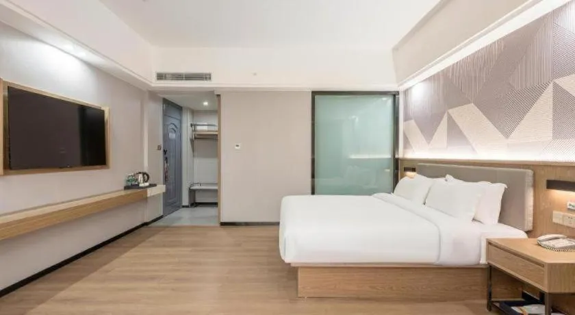 Bed in Borrman Hotel Zhanjiang Jinshawan Chikan Republic of China Style Street