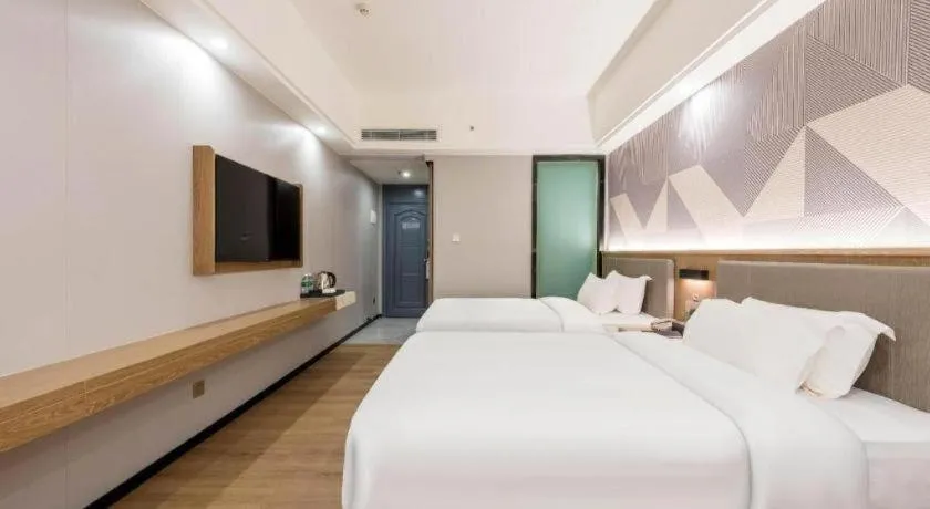 Bed in Borrman Hotel Zhanjiang Jinshawan Chikan Republic of China Style Street