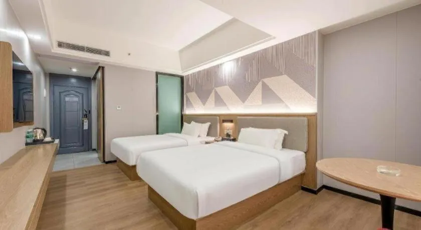 Bed in Borrman Hotel Zhanjiang Jinshawan Chikan Republic of China Style Street