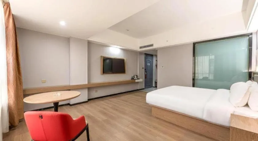 Bed in Borrman Hotel Zhanjiang Jinshawan Chikan Republic of China Style Street