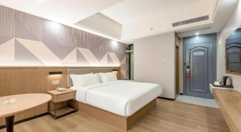 Bed in Borrman Hotel Zhanjiang Jinshawan Chikan Republic of China Style Street