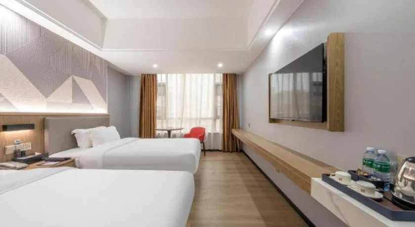 Bed in Borrman Hotel Zhanjiang Jinshawan Chikan Republic of China Style Street