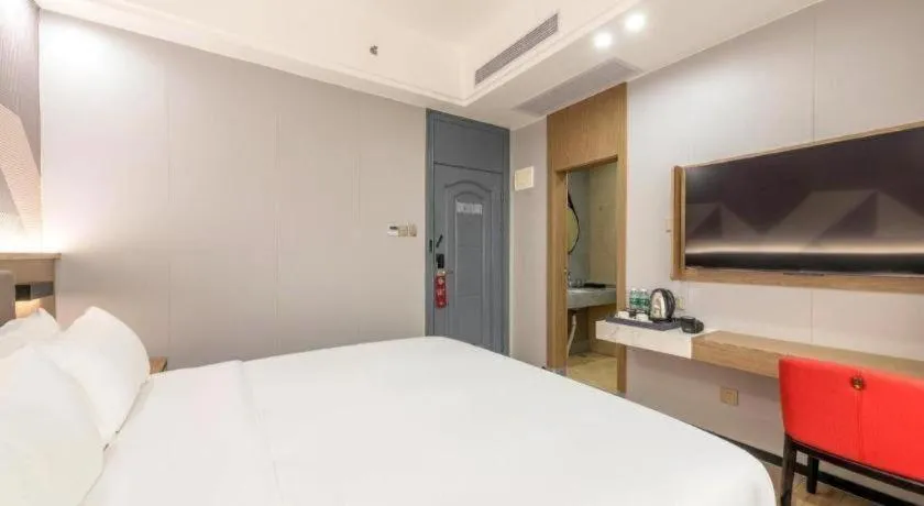 Bed in Borrman Hotel Zhanjiang Jinshawan Chikan Republic of China Style Street