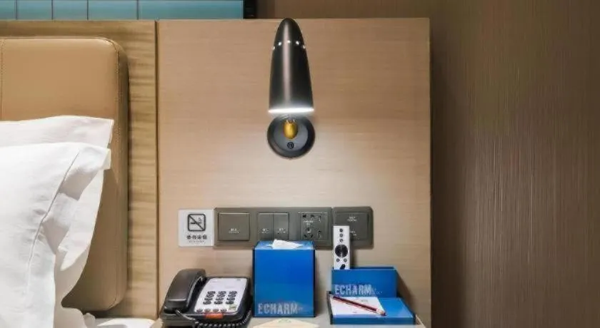 Bed in Echarm Hotel Changsha Yueliangdao Guanziling Metro Station