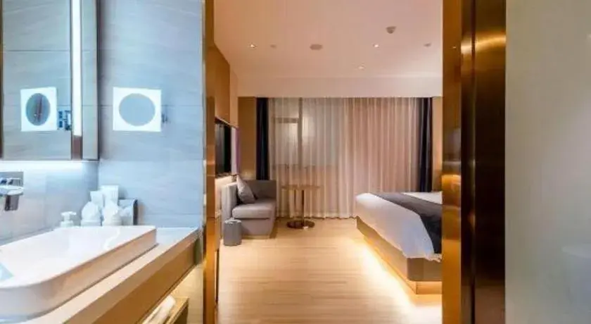 Bed in Borrman Hotel Zhongshan Lihe Plaza Bed in Borrman Hotel Zhongshan Lihe Plaza