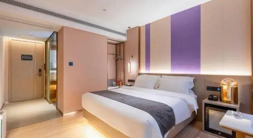 Bed in Borrman Hotel Zhongshan Lihe Plaza Bed in Borrman Hotel Zhongshan Lihe Plaza