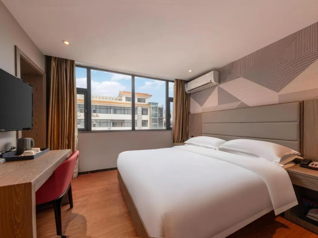 Bed in Borrman Hotel Zhongshan Lihe Plaza