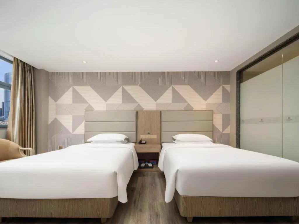 Bed in Borrman Hotel Zhongshan Lihe Plaza