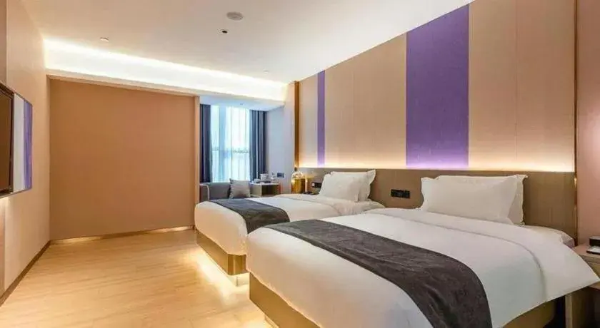 Bed in Borrman Hotel Zhongshan Lihe Plaza Bed in Borrman Hotel Zhongshan Lihe Plaza