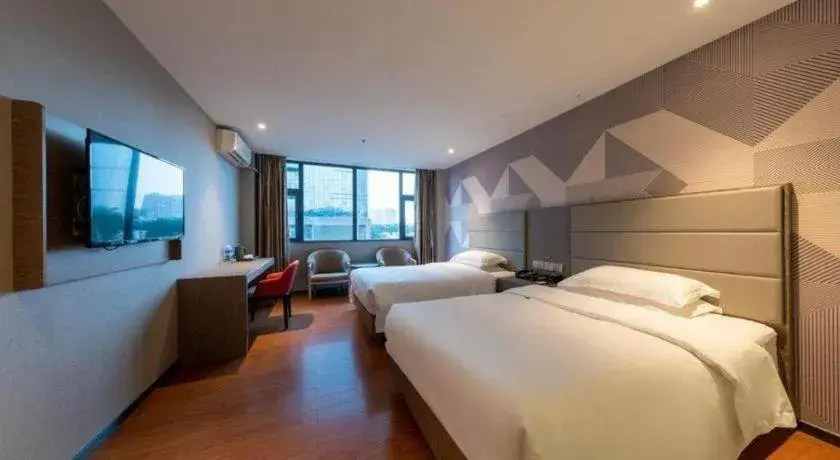 Bed in Borrman Hotel Zhongshan Lihe Plaza Bed in Borrman Hotel Zhongshan Lihe Plaza