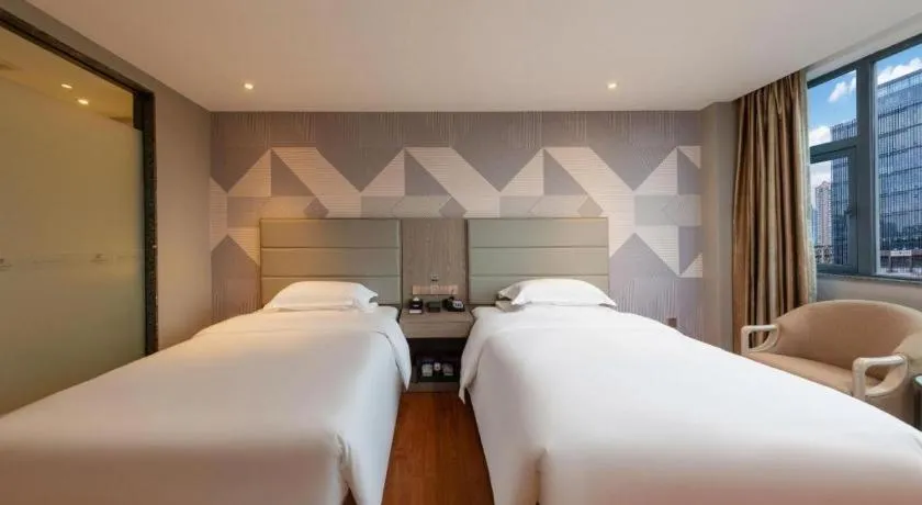 Bed in Borrman Hotel Zhongshan Lihe Plaza