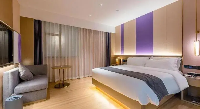 Bed in Borrman Hotel Zhongshan Lihe Plaza Bed in Borrman Hotel Zhongshan Lihe Plaza