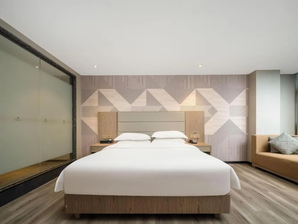 Bed in Borrman Hotel Zhongshan Lihe Plaza