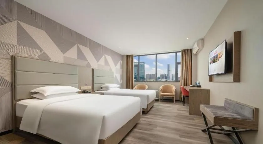 Bed in Borrman Hotel Zhongshan Lihe Plaza