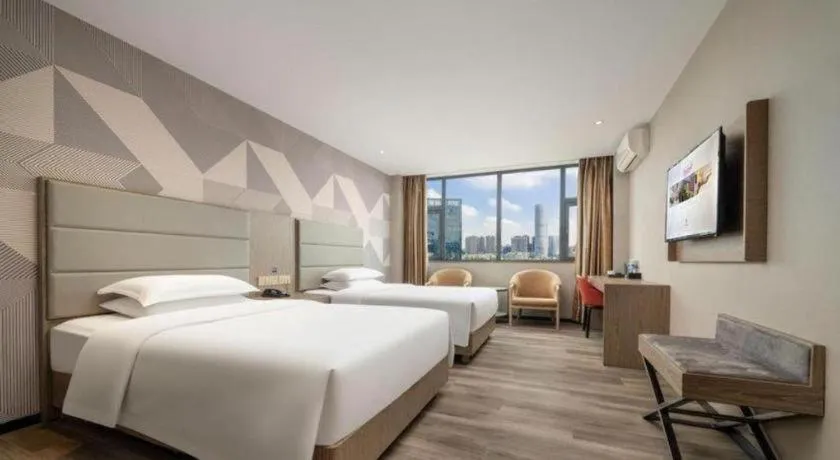 Bed in Borrman Hotel Zhongshan Lihe Plaza