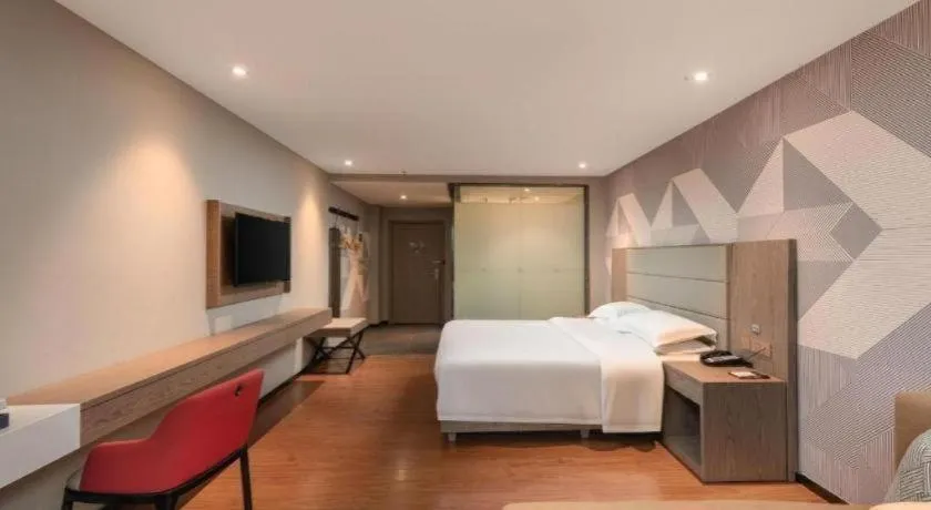 Bed in Borrman Hotel Zhongshan Lihe Plaza